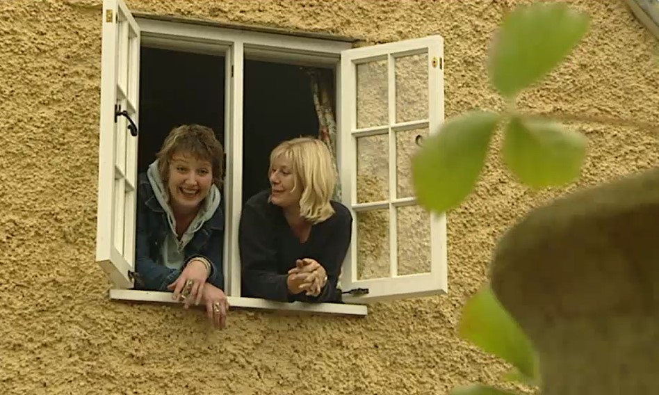 Ann-Marie and Dilys look out the window Ann-Marie and Dilys look out the window