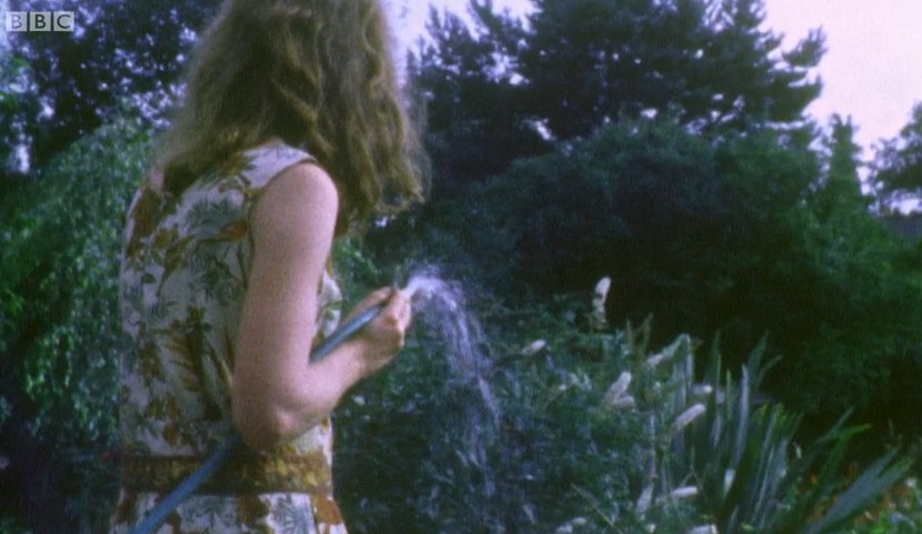 Alys waters the garden Alys waters the garden