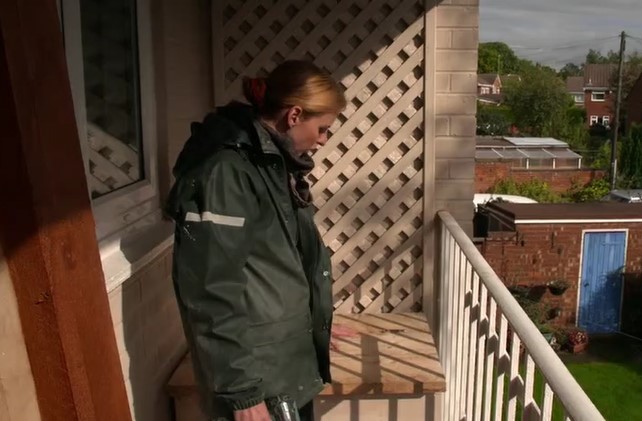 Katie is adding a seat to the trellis she has painted Katie is adding a seat to the trellis she has painted