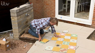 David has some patterned and plain tiles David has some patterned and plain tiles