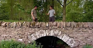 Chris takes Nick to look at wall Chris takes Nick to look at wall